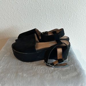 Black platform shoes with ankle clasp
